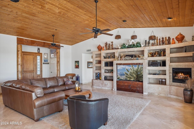 tiled living room with ceiling fan, wooden ceiling, and high vaulted ceiling