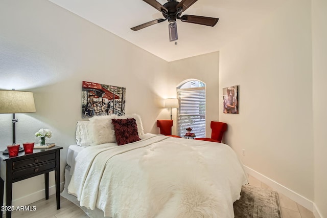 8653 E Royal Palm Rd Unit 1030, Scottsdale, AZ 85258 - bedroom featuring baseboards and ceiling fan
