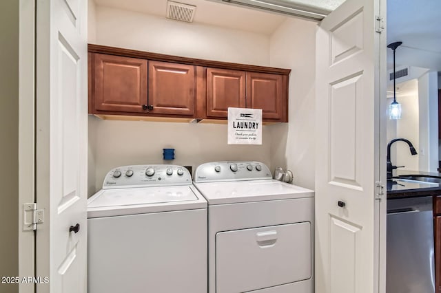 8653 E Royal Palm Rd Unit 1030, Scottsdale, AZ 85258 - laundry area with a sink and washing machine and dryer