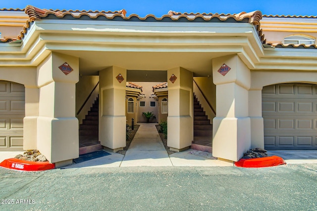 8653 E Royal Palm Rd Unit 1030, Scottsdale, AZ 85258 - property entrance with stucco siding and a tiled roof