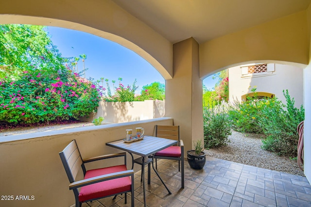 8653 E Royal Palm Rd Unit 1030, Scottsdale, AZ 85258 - view of patio featuring outdoor dining area
