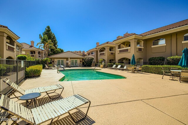 8653 E Royal Palm Rd Unit 1030, Scottsdale, AZ 85258 - community pool featuring a patio