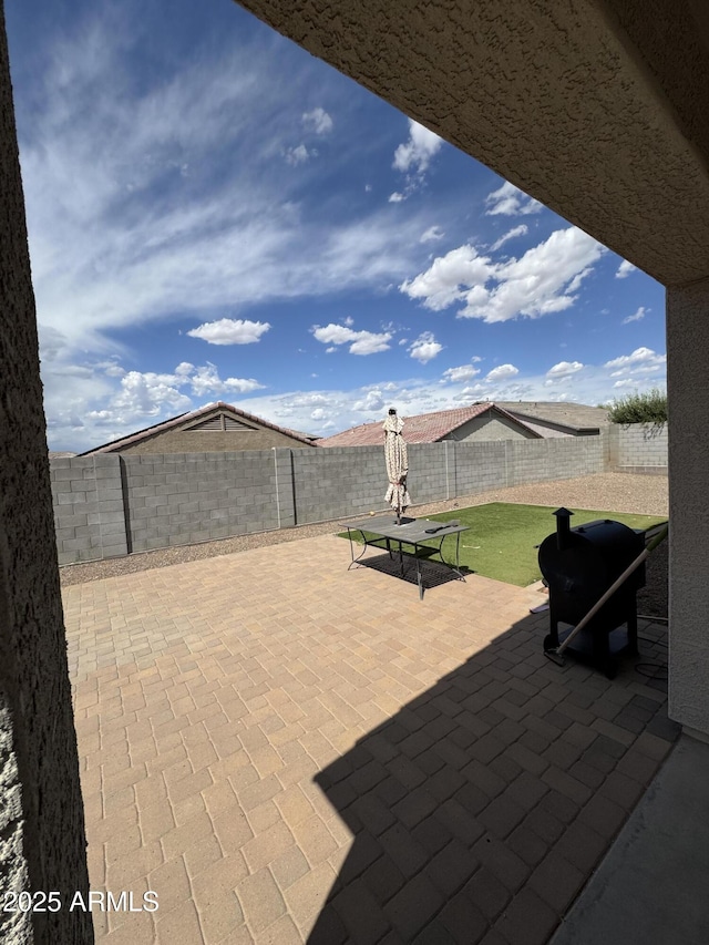 view of patio / terrace with a fenced backyard