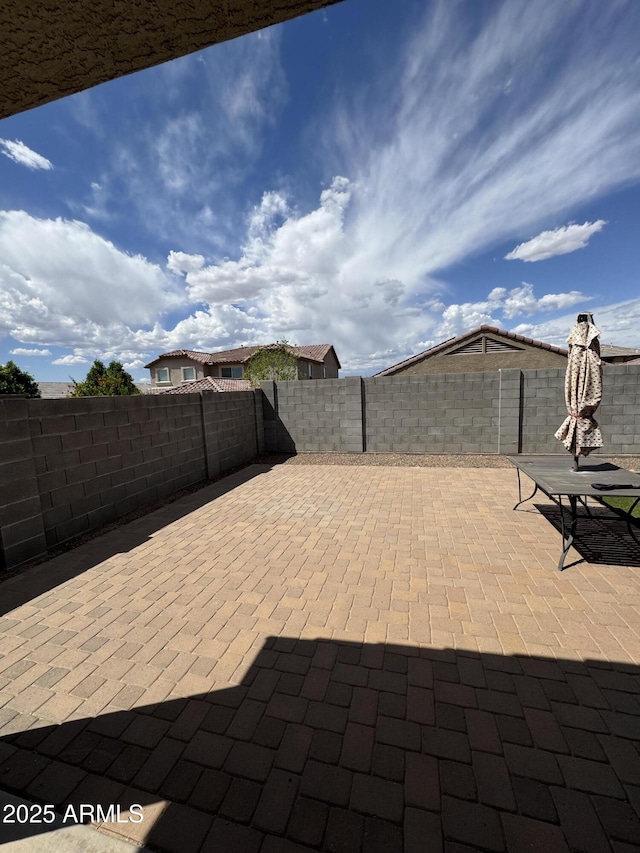 view of patio with a fenced backyard