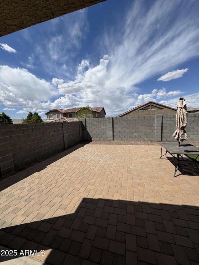 10736 W Swayback Pass, Peoria, AZ 85383 - view of patio with a fenced backyard