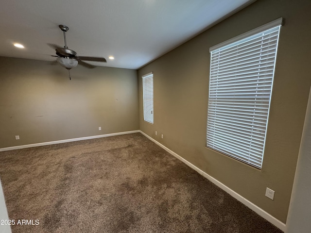 carpeted spare room with baseboards, a ceiling fan, and recessed lighting