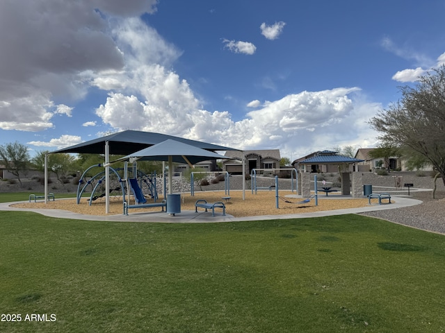 communal playground with a yard and a gazebo