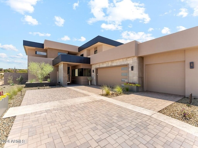 view of front of home with a garage