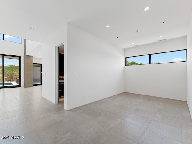 empty room featuring light tile patterned flooring