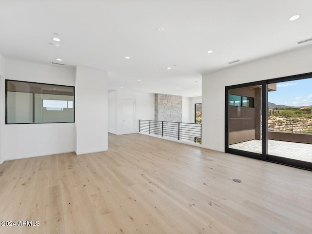 empty room with light wood-type flooring