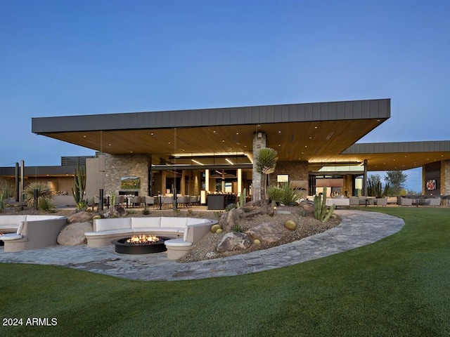 view of patio with a fire pit