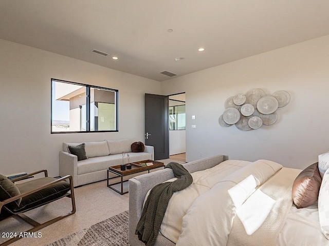 bedroom with light colored carpet