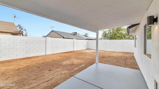 view of yard with a fenced backyard and a patio