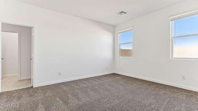 11891 E Cliffrose Ln, Florence, AZ 85132 - carpeted spare room featuring baseboards