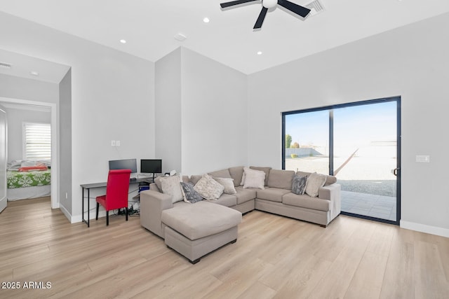 living area with visible vents, recessed lighting, light wood-style flooring, and baseboards