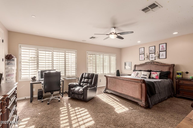 bedroom with ceiling fan and carpet flooring