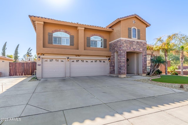 mediterranean / spanish-style house featuring a garage