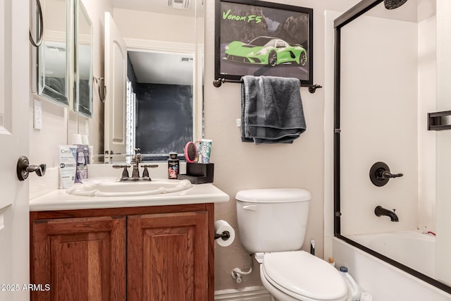 full bathroom featuring toilet, vanity, and combined bath / shower with glass door