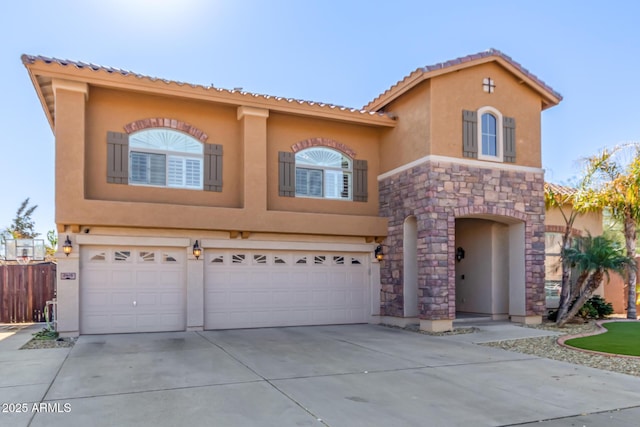 mediterranean / spanish-style home featuring a garage