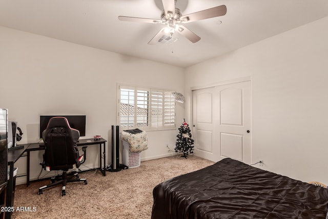 carpeted bedroom with ceiling fan