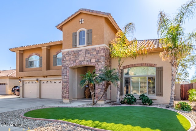 mediterranean / spanish-style house with a front lawn and a garage