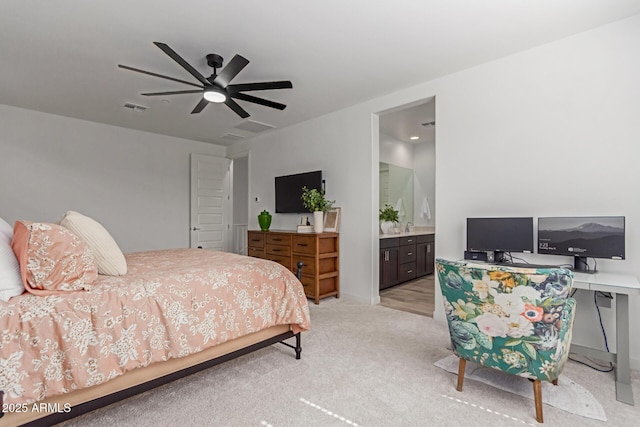 656 S Owl Dr, Gilbert, AZ 85296 - bedroom featuring light colored carpet, ensuite bathroom, and a ceiling fan