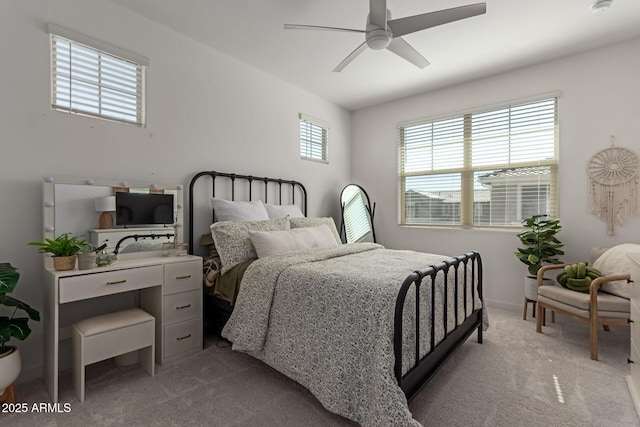 656 S Owl Dr, Gilbert, AZ 85296 - bedroom with light colored carpet and a ceiling fan
