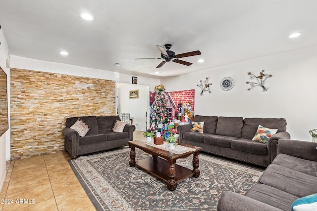 tiled living room with ceiling fan