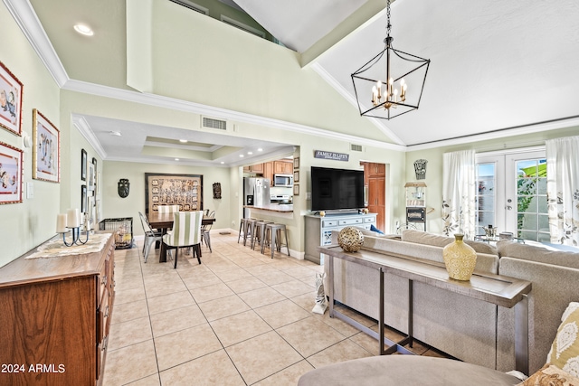 living room with a notable chandelier, light tile patterned flooring, crown molding, and vaulted ceiling