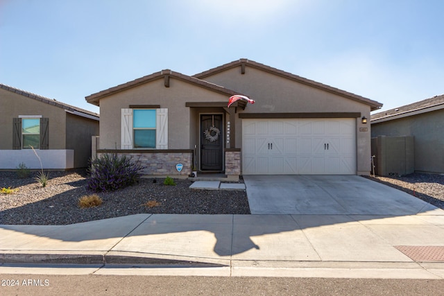 view of front of property with a garage