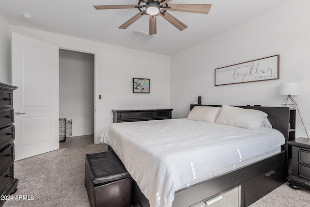 carpeted bedroom featuring ceiling fan