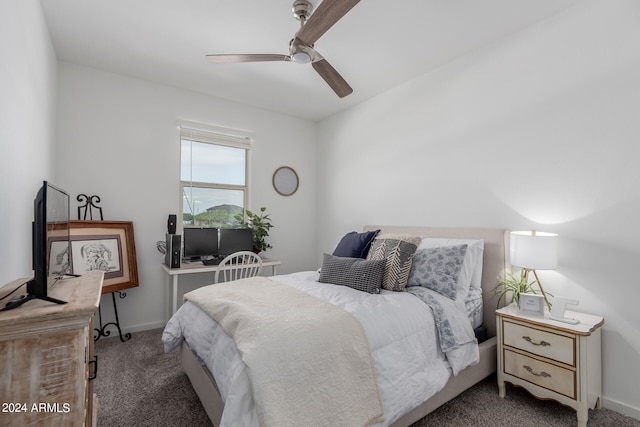 bedroom featuring ceiling fan and light colored carpet