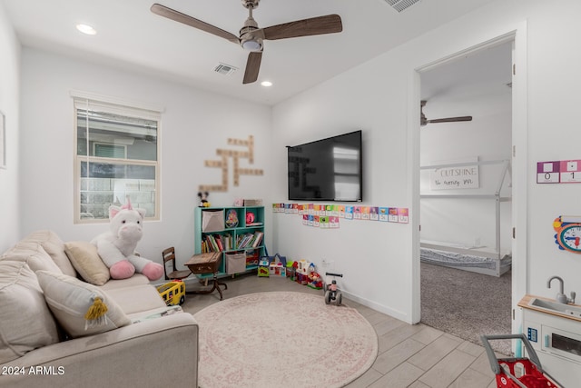 recreation room featuring ceiling fan