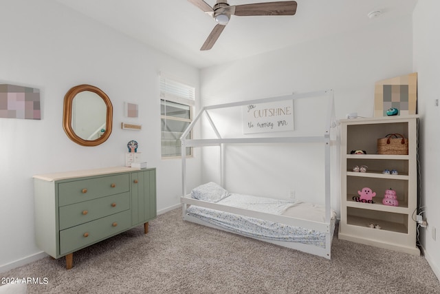 bedroom with light colored carpet and ceiling fan