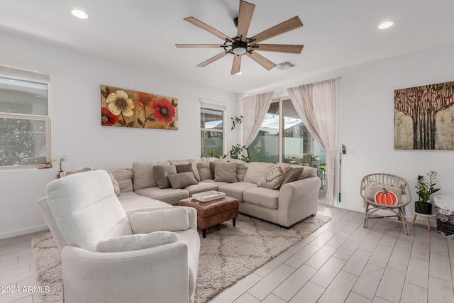 living room with ceiling fan