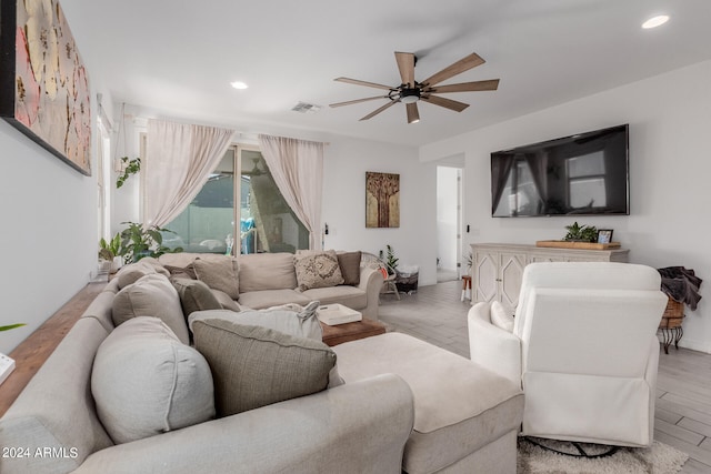 living room with ceiling fan