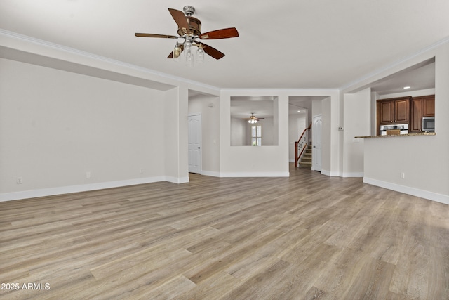 3575 E Gary Way, Gilbert, AZ 85234 - unfurnished living room featuring ceiling fan, ornamental molding, stairs, light wood-type flooring, and recessed lighting