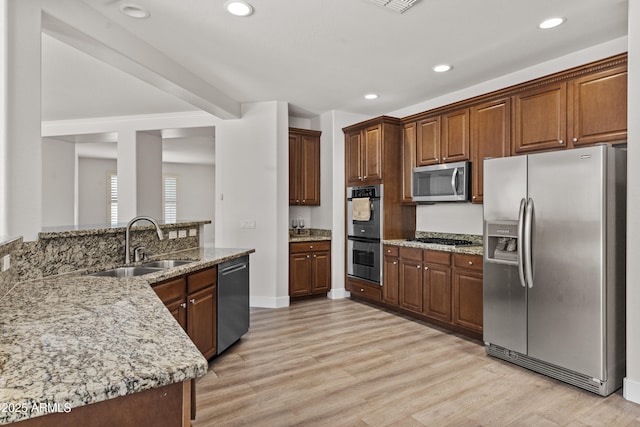 3575 E Gary Way, Gilbert, AZ 85234 - kitchen featuring stainless steel appliances, light wood-style flooring, recessed lighting, and light stone counters