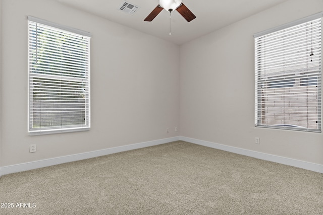 3575 E Gary Way, Gilbert, AZ 85234 - spare room featuring ceiling fan, carpet, and healthy amount of natural light