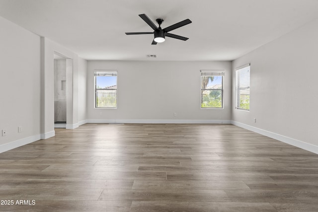 3575 E Gary Way, Gilbert, AZ 85234 - spare room featuring wood finished floors and a ceiling fan