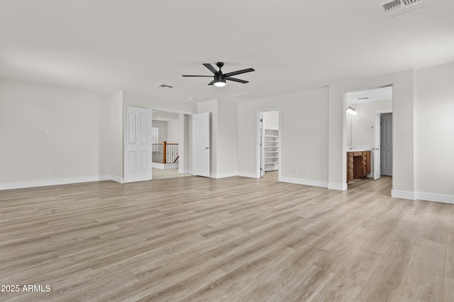 3575 E Gary Way, Gilbert, AZ 85234 - unfurnished living room with light wood-style floors and ceiling fan