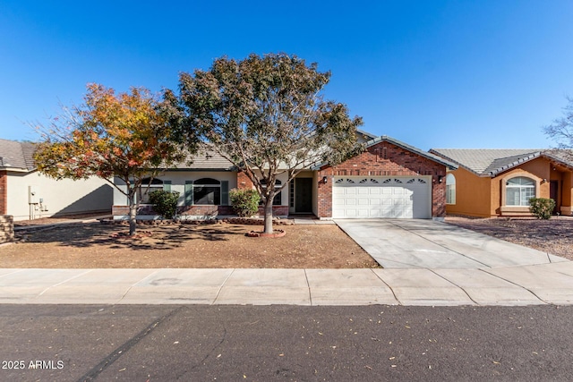 ranch-style home featuring a garage