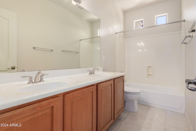 full bathroom featuring vanity with extensive cabinet space, shower / tub combination, double sink, tile flooring, and toilet