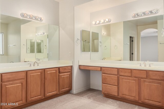 bathroom with dual vanity