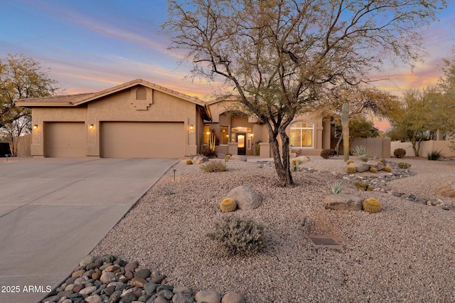 view of front of property with a garage