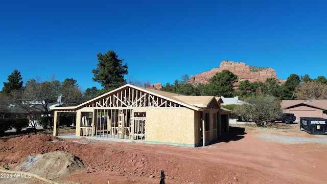 view of front of house with a mountain view