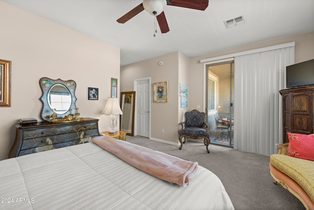 bedroom featuring ceiling fan and carpet