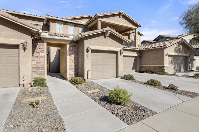 view of front of property with a garage