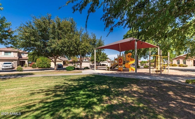 community jungle gym with a lawn