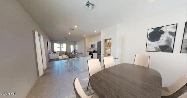 13179 E Verbina Ln, Florence, AZ 85132 - dining area featuring recessed lighting and light tile patterned floors